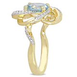 Miadora Yellow Plated Sterling Silver Sky-Blue and White Topaz Swirl Halo Ring