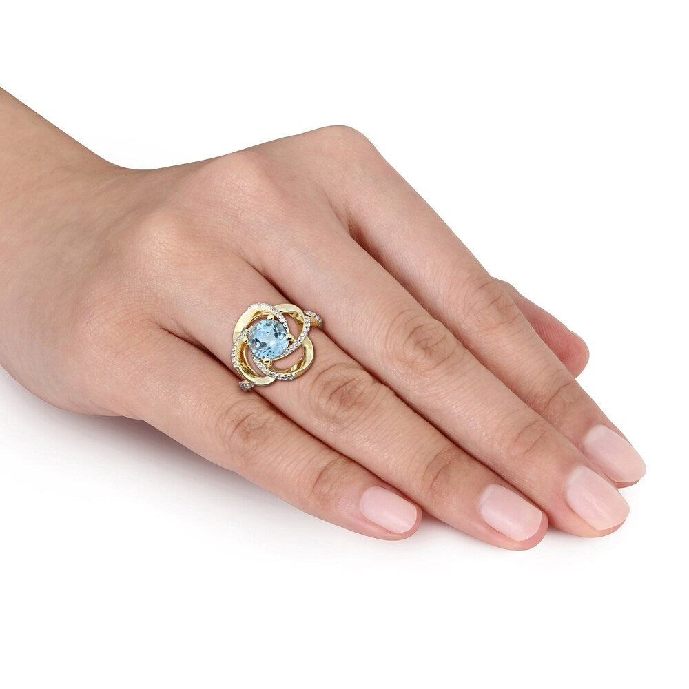 Miadora Yellow Plated Sterling Silver Sky-Blue and White Topaz Swirl Halo Ring