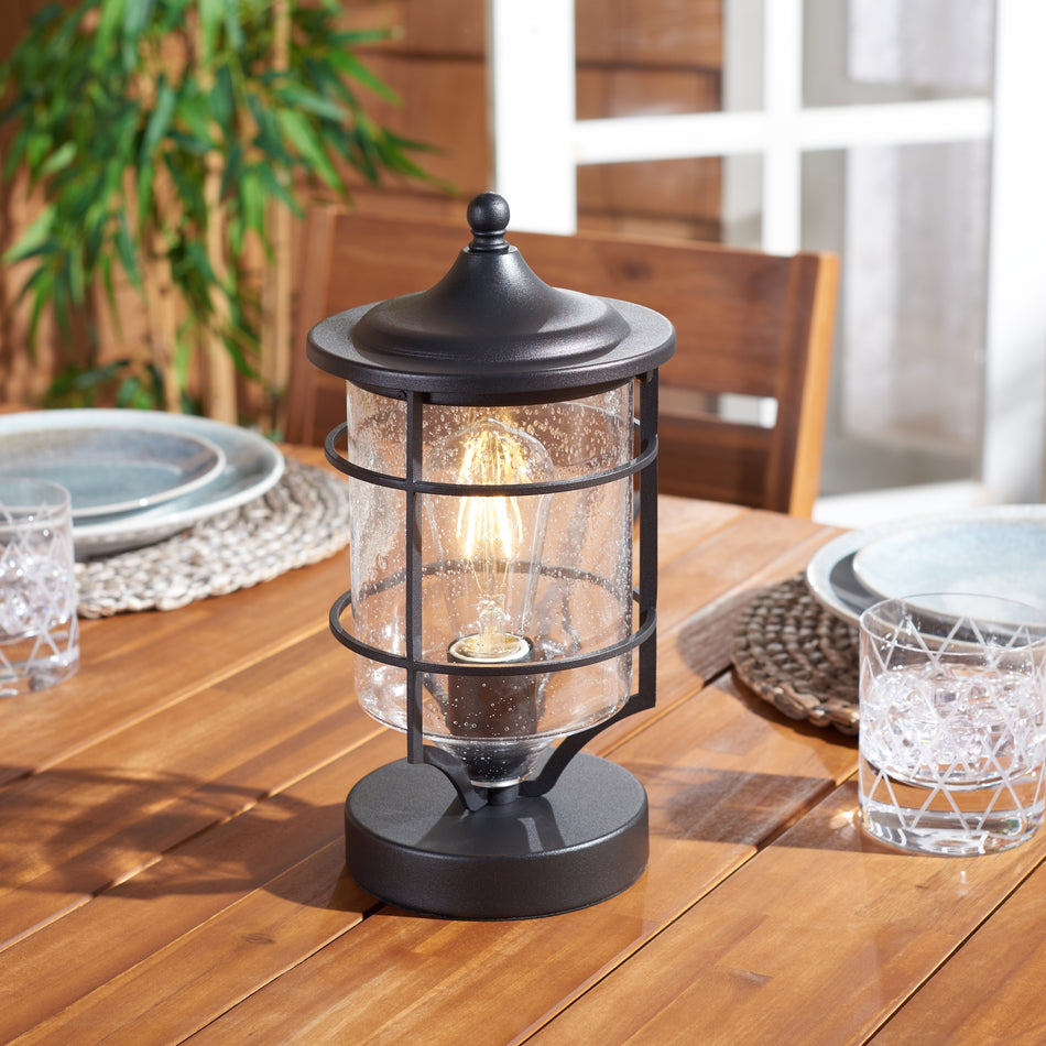 SAFAVIEH Outdoor Lighting Collection Rueda 6" Rustic Outdoor Table Lamp - 6" W x 6" D x 12" H